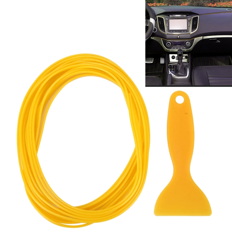 Flexible yellow car interior trim strip with film scraper tool, coiled roll