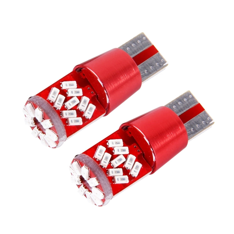 Pair of T10 LED bulbs with red cylindrical body and silver LED ends