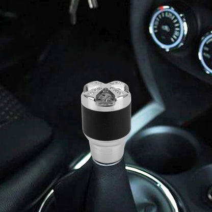 Universal shift knob with black grip, silver ring, and chrome diamond top