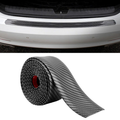 Black carbon-fiber-look car door threshold decorative strip sticker, rolled view