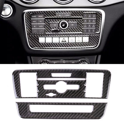 Carbon fiber CD panel sticker with white cutouts and stereo control button openings