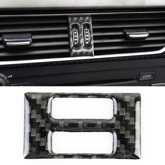 Carbon fiber air conditioning switch trim sticker on car dashboard, two switch openings