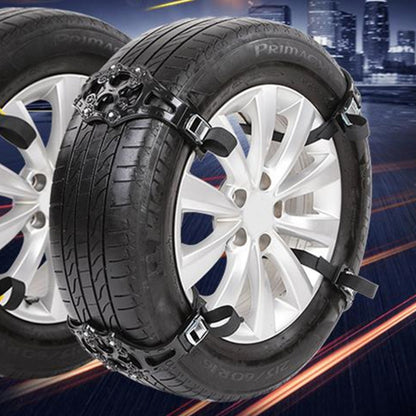 Car tire with black anti-skid chain fitted around steel wheel rim