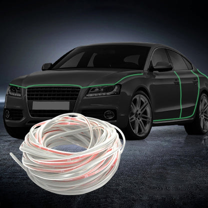 Luminous PVC decorative light strip coil with white tubing, shown near a car