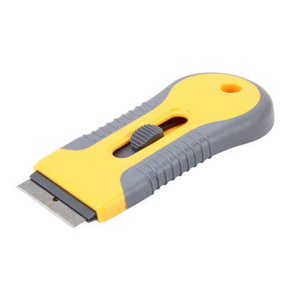 Window film scraper tool with yellow plastic handle and grey non-slip grip