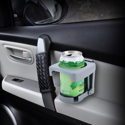 Gray car drink can holder mounted on dashboard, holding a metal can.