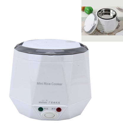 White mini rice cooker with dark lid and front power controls