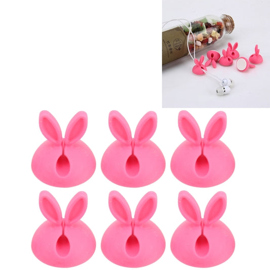 Pink rabbit-shaped single-hole cable clips, six-pack for cord organization.