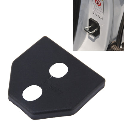 Black plastic car door lock cover with two keyholes, hex-corner design.