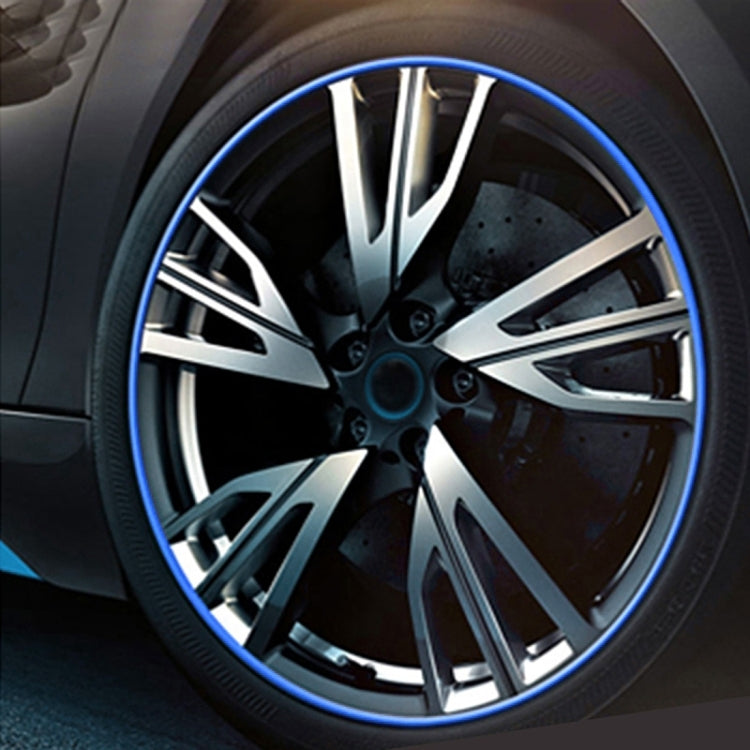 Decorative car wheel hub trim strip with blue edge around alloy wheel