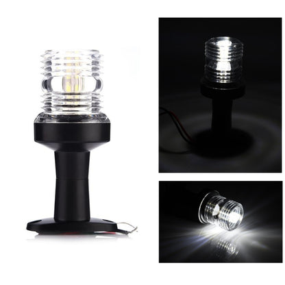 Black LED navigation pedestal light with clear lens; white glow and attached red/black wires