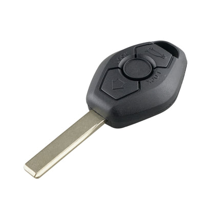 Black remote car key with metal blade and circular control buttons on fob.