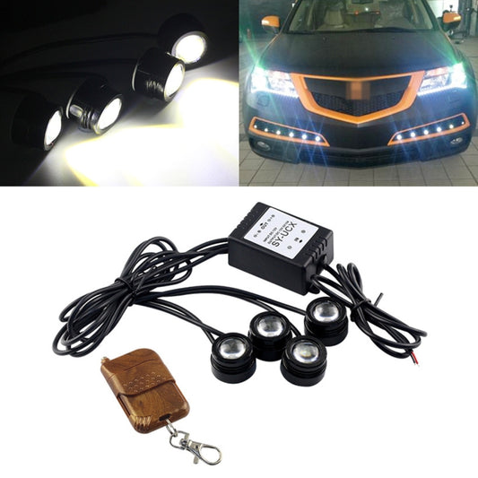 Car LED reversing light bulbs with black mounts, glowing bright white