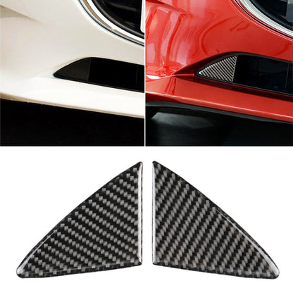 Carbon fiber front bumper decorative sticker installed over black vent trim