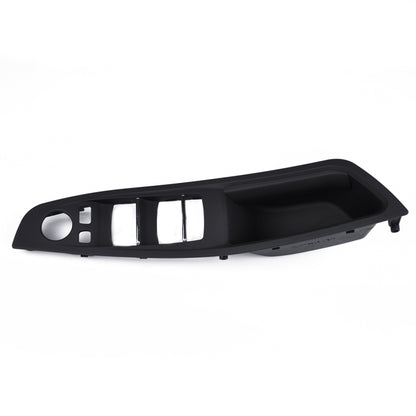 Black front door handle window switch panel with switch cutouts and chrome trim