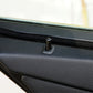 Black car door lock cover cap with round base on door panel