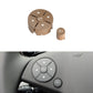 Beige steering wheel switch button panel with OK ring and arrow icons, left control