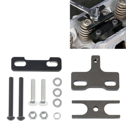 Valve spring compressor tool kit with black bracket plates, bolts, and washers