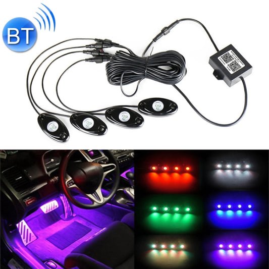RGB car atmosphere light kit with four oval pods, wiring harness, and Bluetooth controller