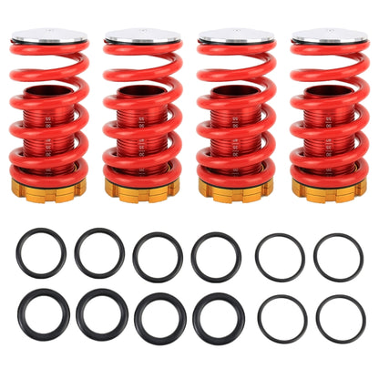 Adjustable red coilover shock spring set with silver top plates and yellow bases, plus seals