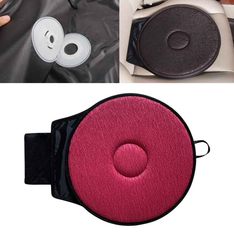 Wine red circular car seat cushion mat with black trim and center ring detail