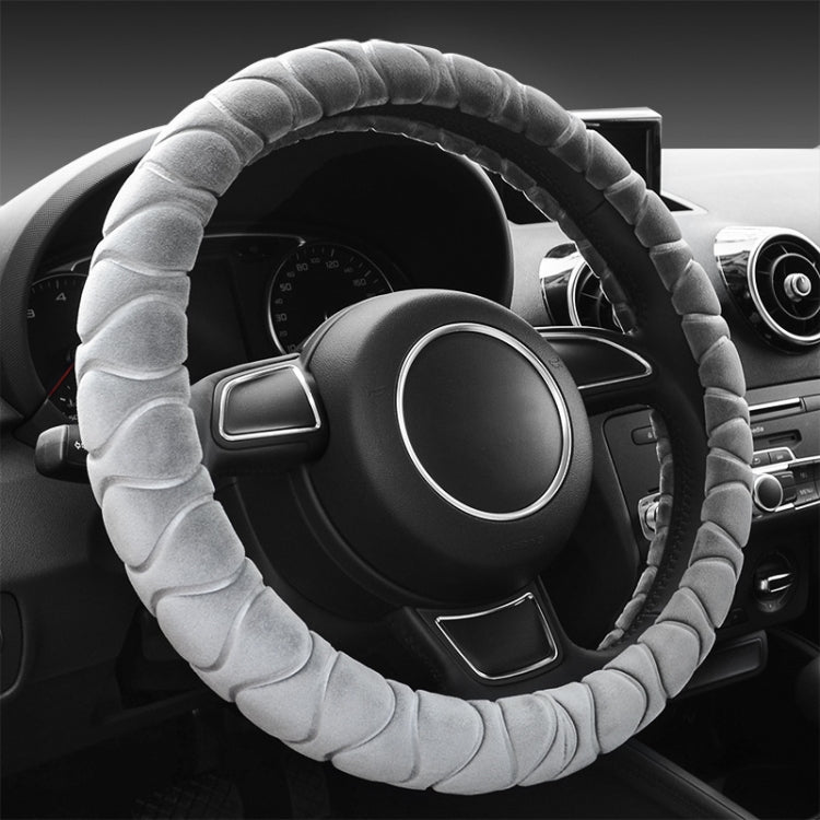 Light gray plush steering wheel cover with ribbed texture, anti-slip grip.