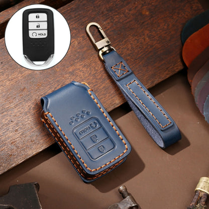 Blue leather key fob protective cover with stitched edges and key strap loop