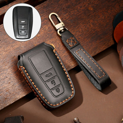 Black leather key fob protective cover with stitched edges and metal key ring loop