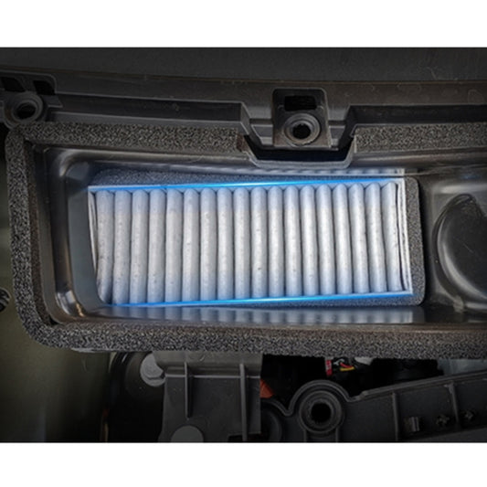 Cabin air filter installed in HVAC housing, pleated filter element