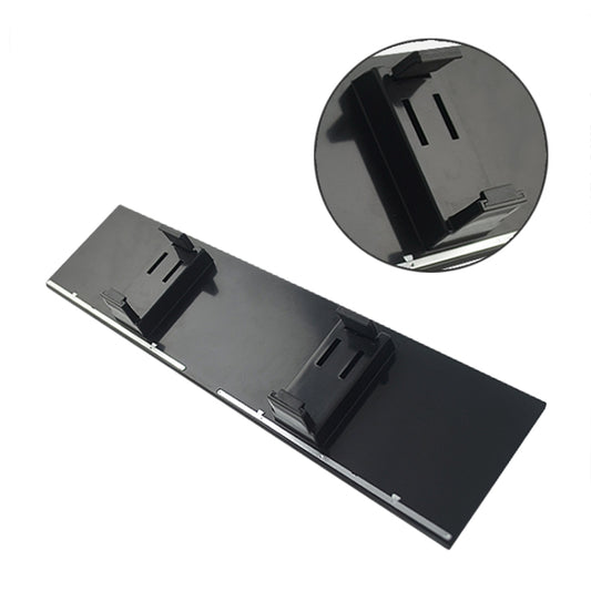 Auxiliary rearview mirror, underside view showing 3 mounting clips