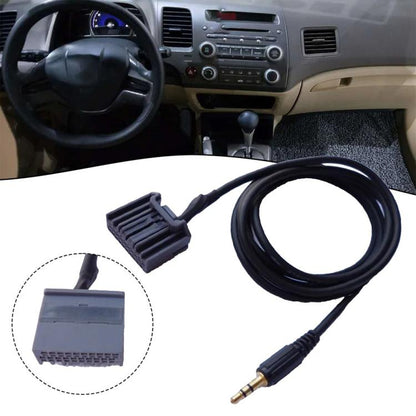 Car AUX audio cable with 3.5mm plug and gray vehicle connector