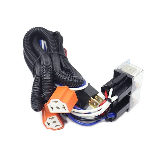 Headlight brightener cable with two lamp sockets, black wiring loom, and harness connectors