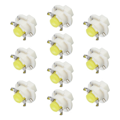 Yellow wedge LED indicator bulb with white plastic base and metal pins