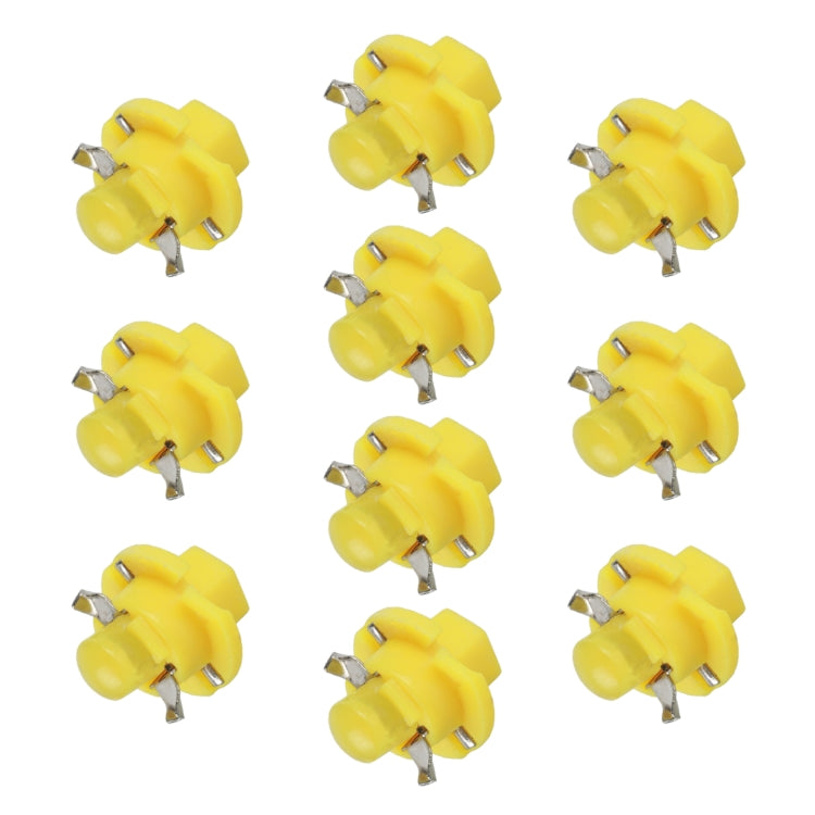 Set of yellow wedge LED indicator bulbs with white bases and metal pins