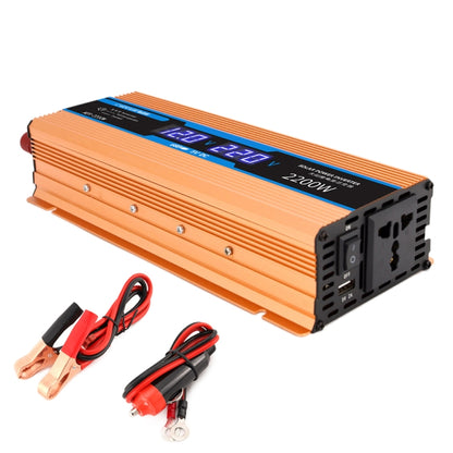 Orange car power inverter with dual digital display and cooling vents.