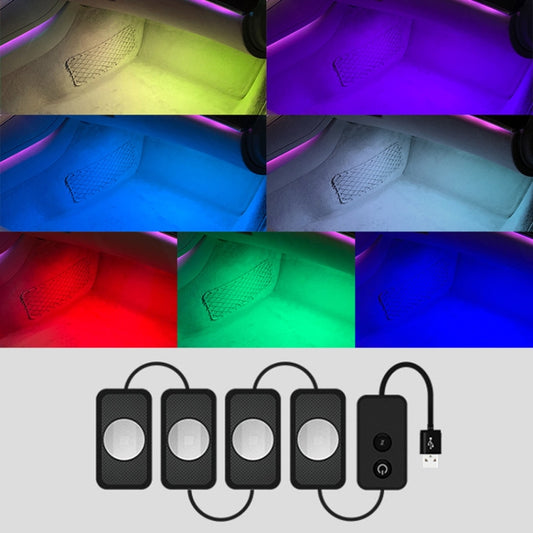 Car RGB foot LED light kit with four light pads, cables, and USB controller module