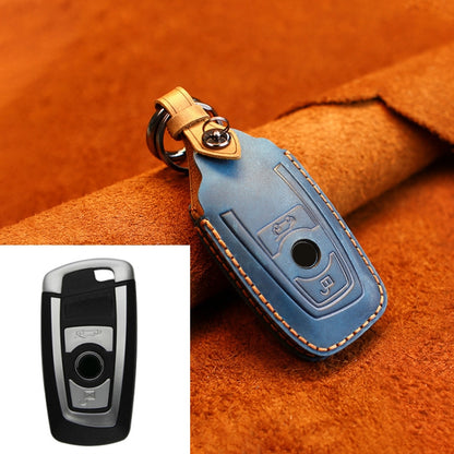 Blue leather key protective cover with keyring and stitched remote button slot