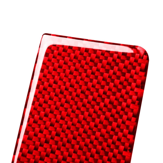 Red carbon-fiber style inner armrest gasket sticker, close-up textured finish