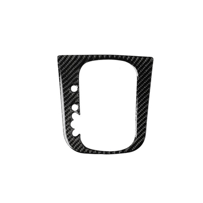 Carbon fiber gear shift trim sticker with oval cutout and two mounting holes