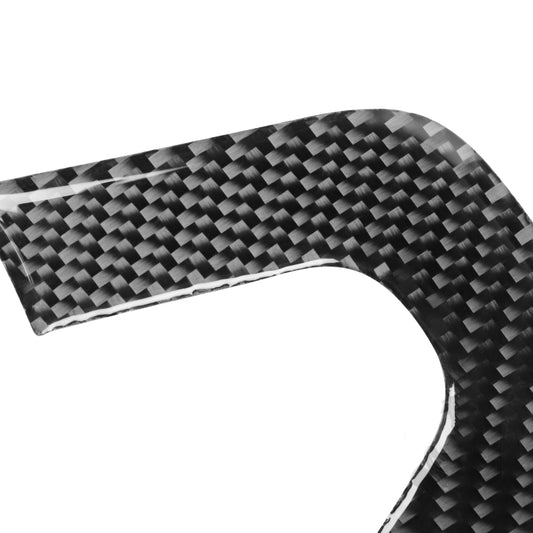 Close-up carbon fiber steering wheel chin sticker, black weave texture