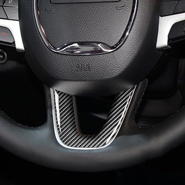 Installed carbon fiber steering wheel chin trim insert, black weave pattern