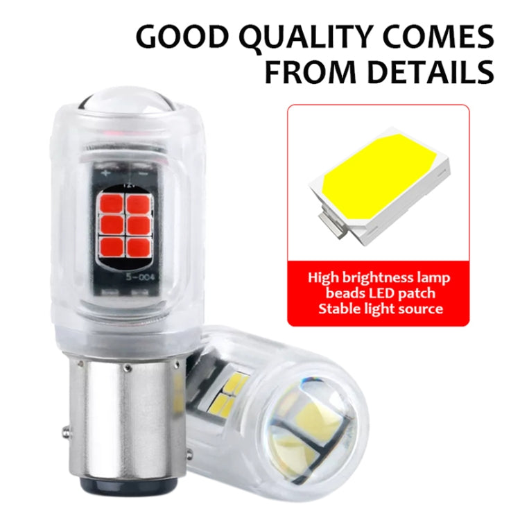 Clear LED car brake light bulb with metal base and yellow LED chip, close-up view