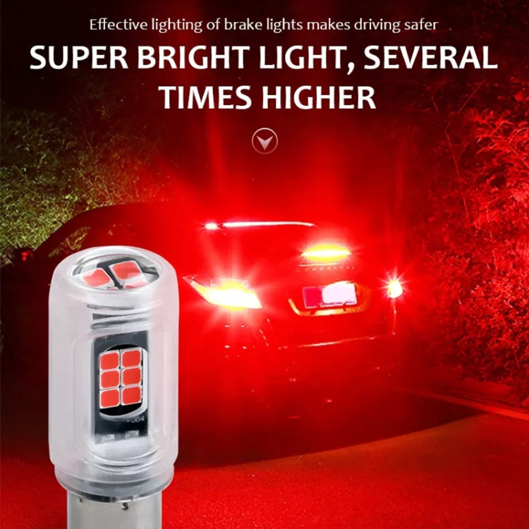 Single clear LED car brake light bulb with metal base and red LED array, lit