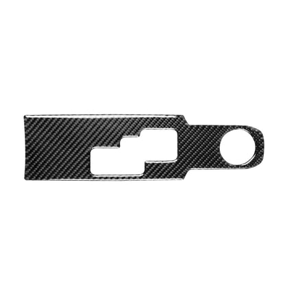 Carbon fiber gear shift panel sticker with rectangular cutout and round hole, dark black