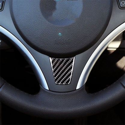 Triangular carbon-fiber steering wheel trim sticker with black-and-gray woven pattern
