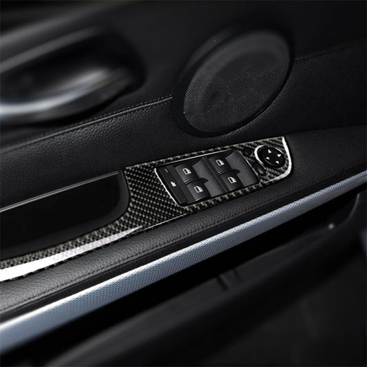 Carbon fiber car door switch panel trim sticker with cutout for control buttons