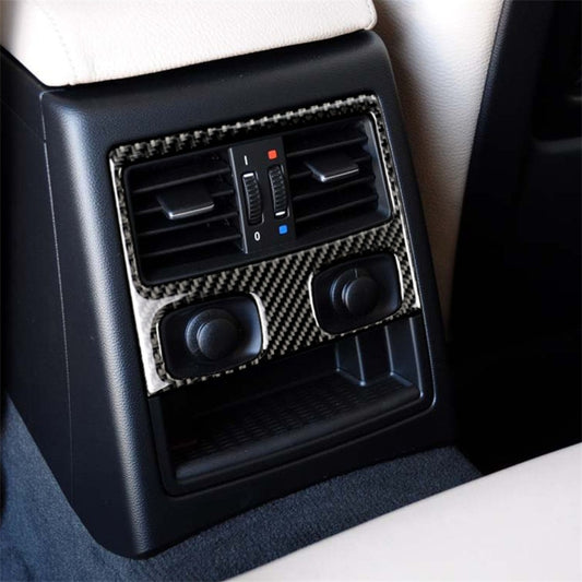 Carbon fiber rear air vent trim sticker, installed with twin vents and center controls