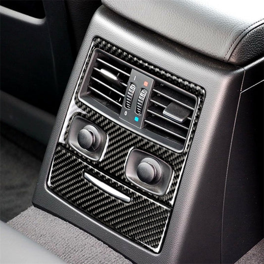 Carbon fiber-style rear air vent trim sticker with knobs and central hole cutout