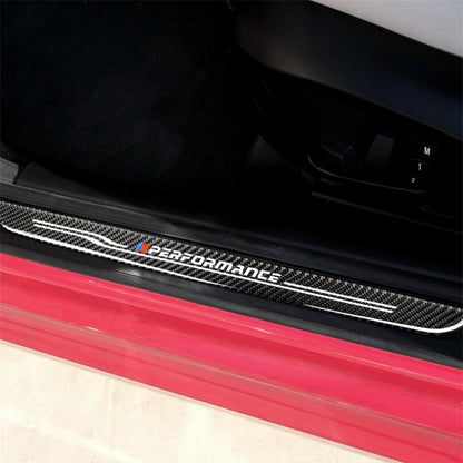 Carbon fiber door sill sticker with 'Performance' logo and silver stripe, red accent.