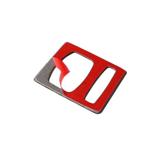 Red-and-black air vent trim insert with a white cutout center